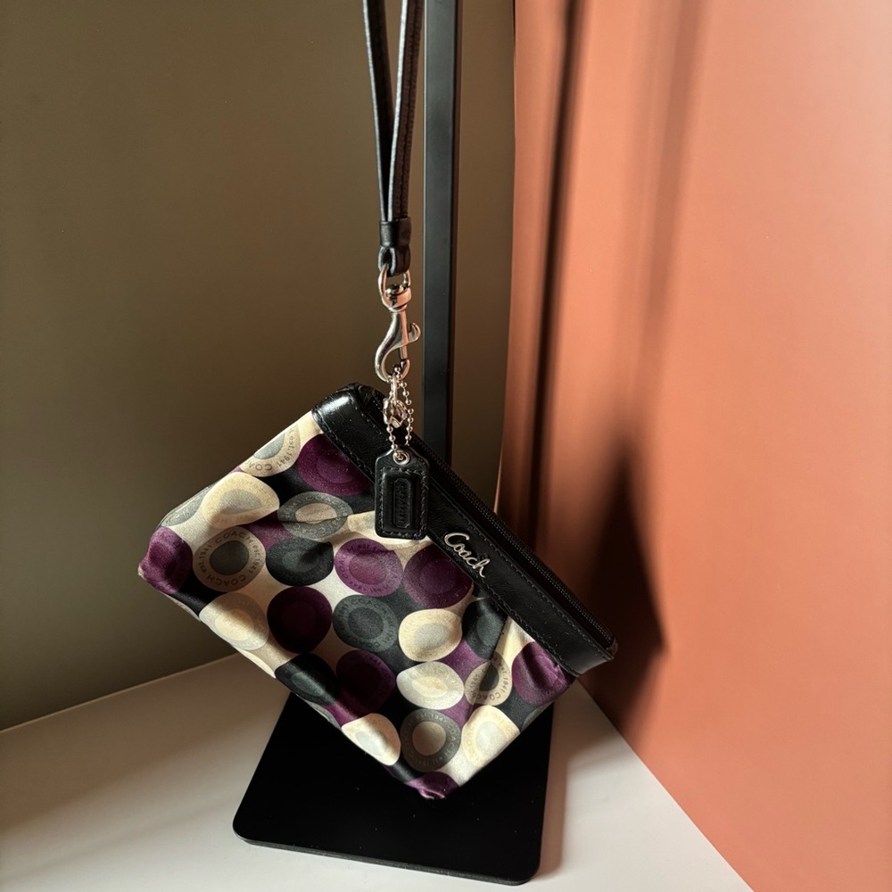 COACH Madison, multicolored satin wristlet with black patent leather trim